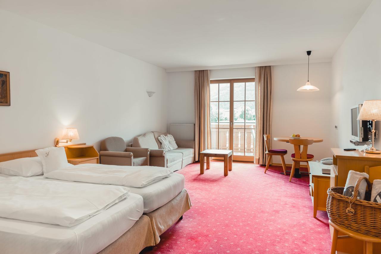 Hotel Tiefenbrunn Gardensuites & Breakfast Lana Bilik gambar